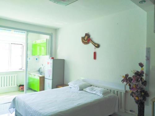 Imagen de la habitación del 伊春市汤旺河缘梦家庭旅馆. Foto 6