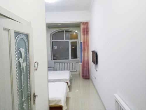 Imagen general del 伊春市汤旺河缘梦家庭旅馆. Foto 2