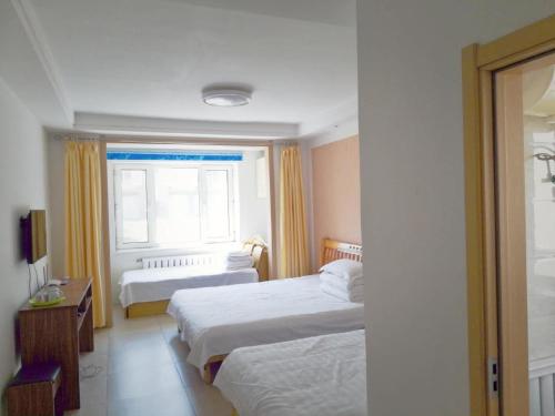 Imagen de la habitación del 伊春市汤旺河缘梦家庭旅馆. Foto 10