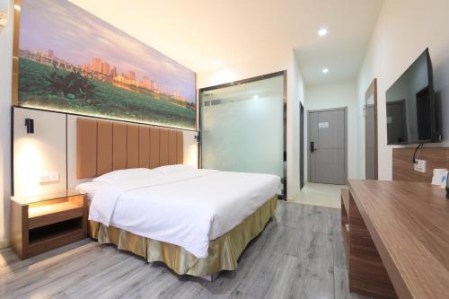 Imagen de la habitación del 怡佳商务酒店. Foto 18