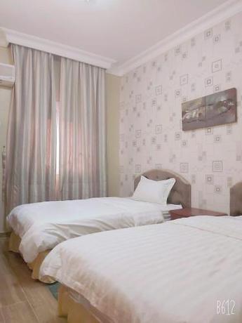 Imagen de la habitación del الورود للشقق المخدومة. Foto 10