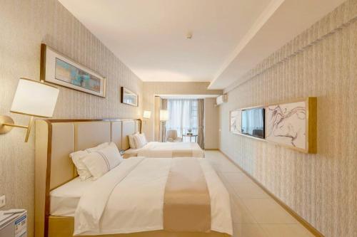 Imagen de la habitación del 维福顿公寓广交会期间免费穿梭巴士. Foto 19