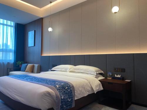 Imagen de la habitación del 云瑞凤凰酒店. Foto 13