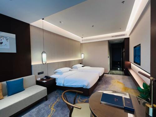 Imagen de la habitación del 云瑞凤凰酒店. Foto 14