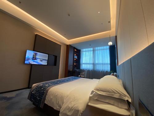 Imagen de la habitación del 云瑞凤凰酒店. Foto 16