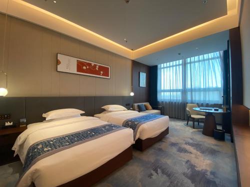 Imagen de la habitación del 云瑞凤凰酒店. Foto 17