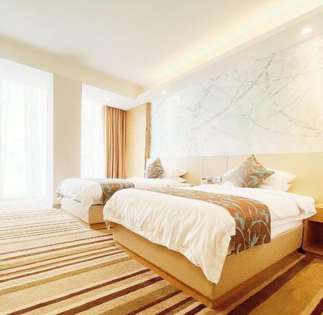Imagen de la habitación del 酒钢大酒店. Foto 13