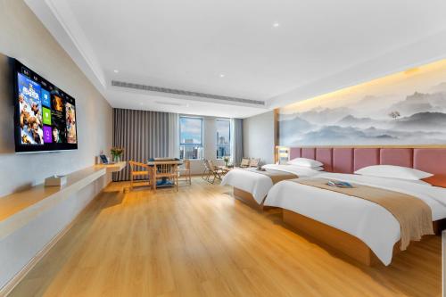 Imagen de la habitación del 瓣朵海景酒店（昆明南站春融街地铁站店）. Foto 15