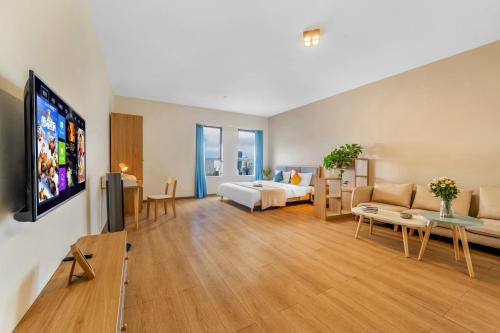 Imagen de la habitación del 瓣朵海景酒店（昆明南站春融街地铁站店）. Foto 16