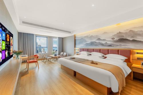 Imagen de la habitación del 瓣朵海景酒店（昆明南站春融街地铁站店）. Foto 17