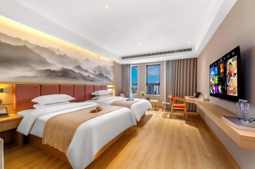 Imagen de la habitación del 瓣朵海景酒店（昆明南站春融街地铁站店）. Foto 18