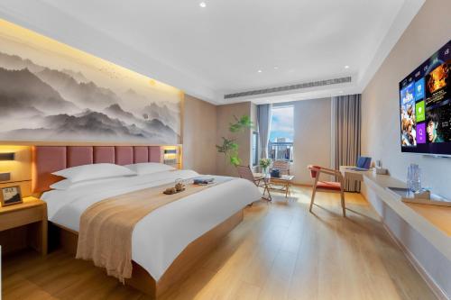 Imagen de la habitación del 瓣朵海景酒店（昆明南站春融街地铁站店）. Foto 19