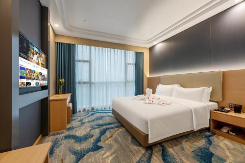 Imagen de la habitación del 厦门探索酒店. Foto 17