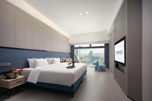 Imagen de la habitación del 昱泰酒店公寓(万象城店). Foto 17