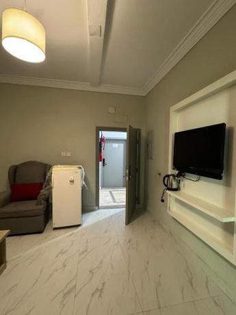 Imagen de la habitación del المضياف الذهبية للشقق المفروشة. Foto 19