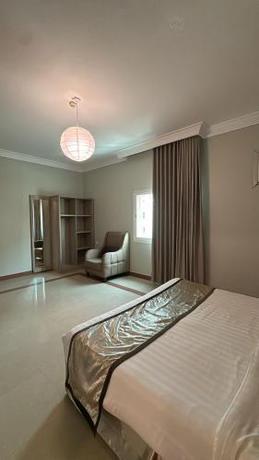 Imagen de la habitación del المضياف الذهبية للشقق المفروشة. Foto 20