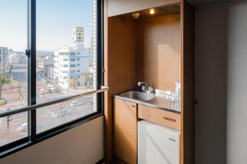 Imagen de la habitación del マンゴーホテル宮崎. Foto 12