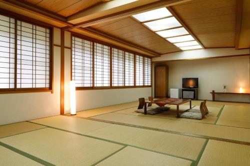 Imagen de la habitación del たまご肌美人の湯　美榛苑. Foto 19