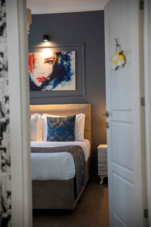 Imagen de la habitación del 12 Rooms Boutique Hotel. Foto 16