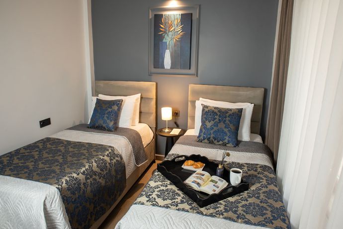 Imagen de la habitación del 12 Rooms Boutique Hotel. Foto 17