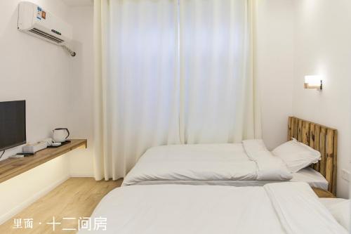 Imagen general del 12 Rooms Inn. Foto 2