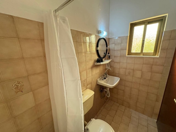 Imagen de la habitación del 3 little pigs apartments. Foto 9