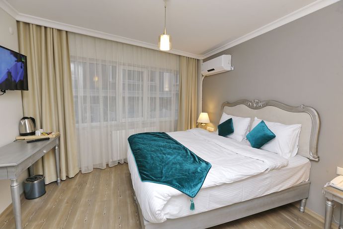 Imagen de la habitación del 4 Angels Hotel. Foto 2