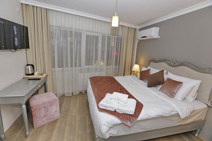 Imagen de la habitación del 4 Angels Hotel. Foto 4
