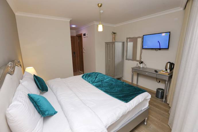 Imagen de la habitación del 4 Angels Hotel. Foto 5