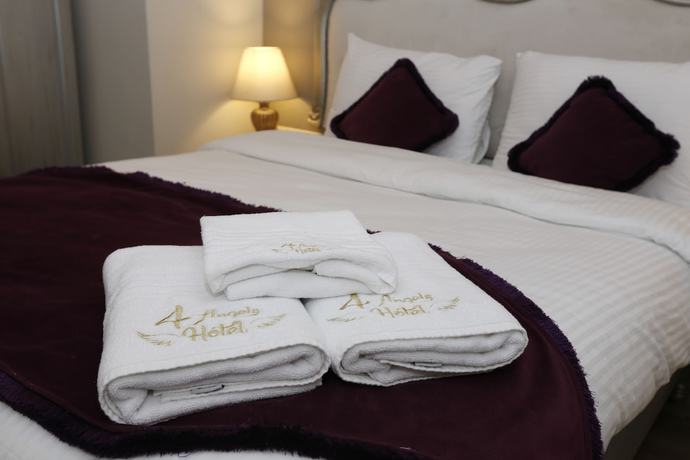 Imagen de la habitación del 4 Angels Hotel. Foto 6