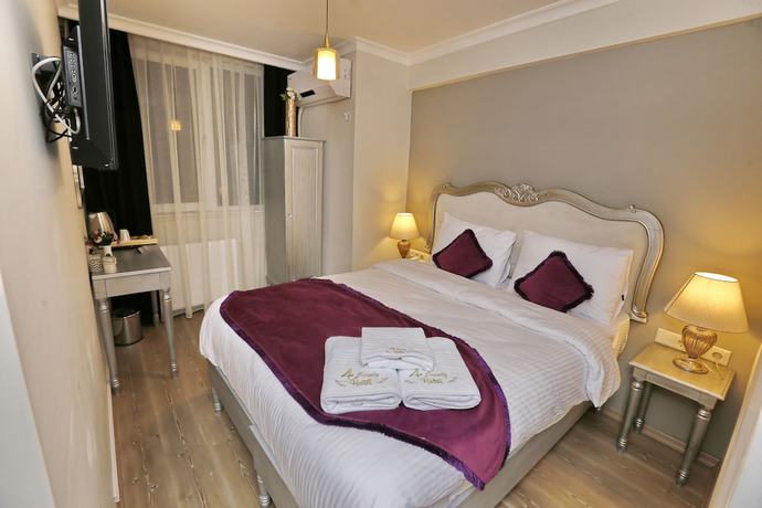 Imagen de la habitación del 4 Angels Hotel. Foto 7