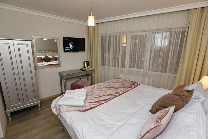 Imagen de la habitación del 4 Angels Hotel. Foto 8