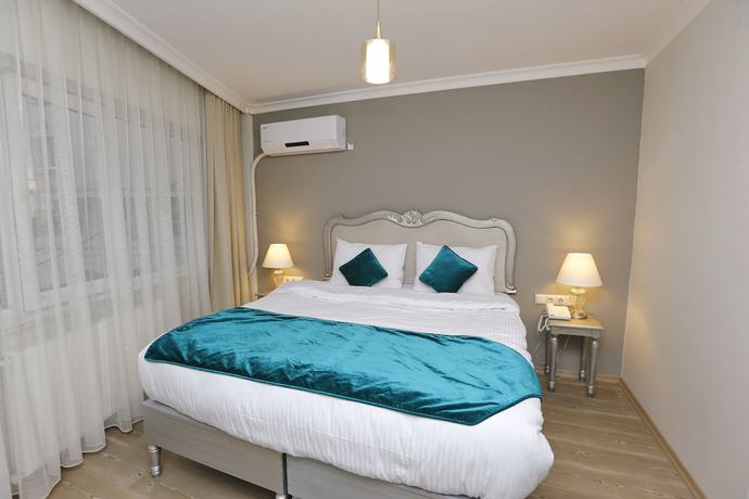 Imagen de la habitación del 4 Angels Hotel. Foto 9