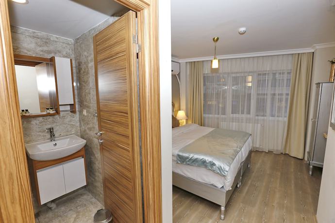 Imagen de la habitación del 4 Angels Hotel. Foto 11