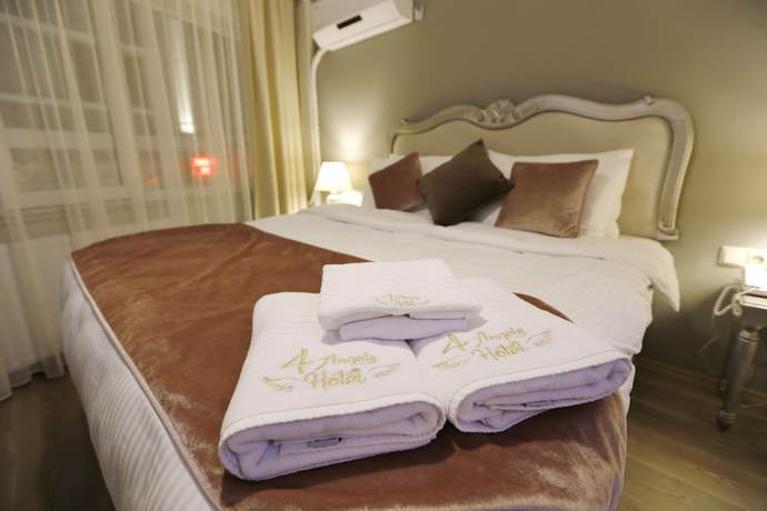 Imagen de la habitación del 4 Angels Hotel. Foto 13