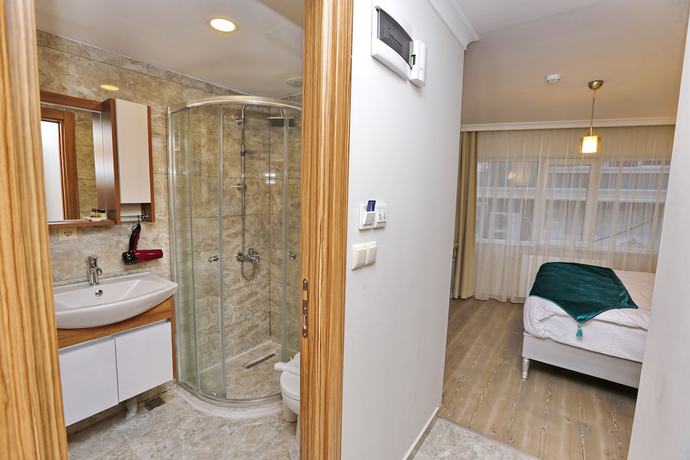 Imagen de la habitación del 4 Angels Hotel. Foto 15