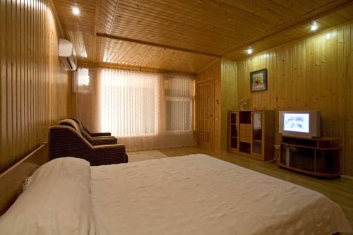 Imagen de la habitación del 4-sezona Hotel. Foto 24