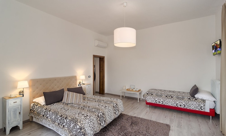 Imagen de la habitación del 7 Rooms, Pisa Ciudad. Foto 2