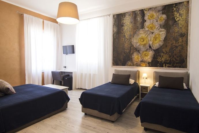 Imagen de la habitación del 7 Rooms, Pisa Ciudad. Foto 4