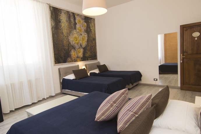 Imagen de la habitación del 7 Rooms, Pisa Ciudad. Foto 5