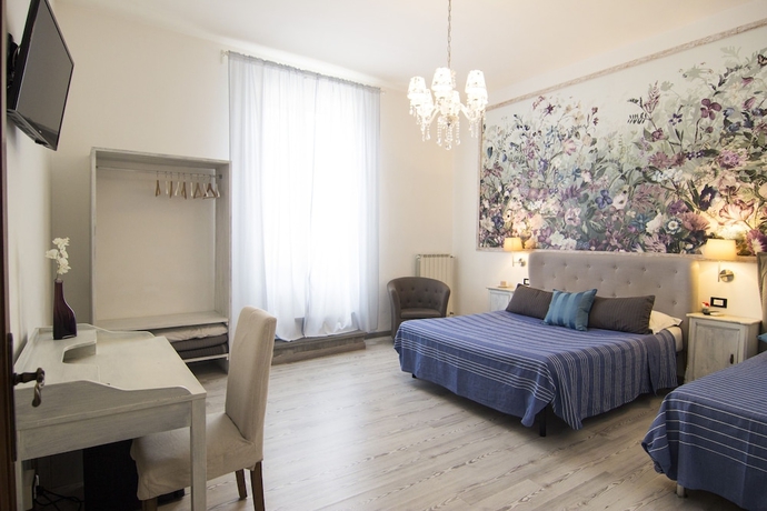 Imagen de la habitación del 7 Rooms, Pisa Ciudad. Foto 6