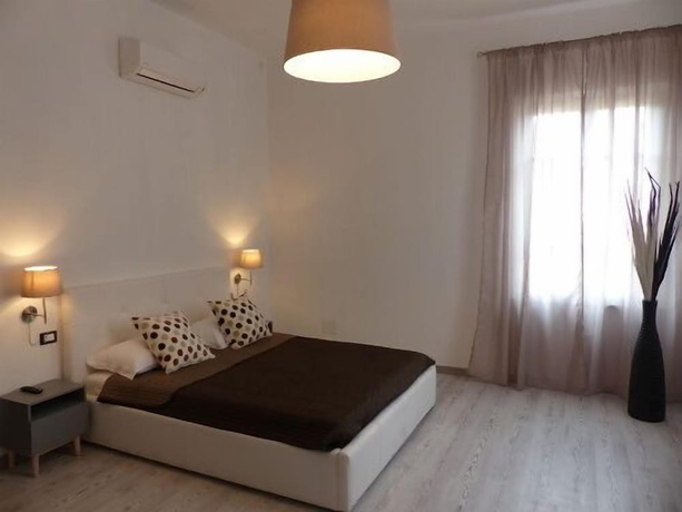 Imagen de la habitación del 7 Rooms, Pisa Ciudad. Foto 8