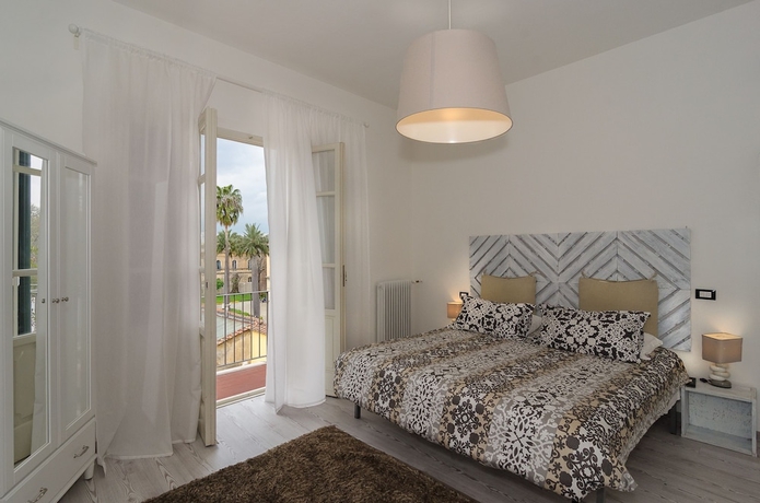 Imagen de la habitación del 7 Rooms, Pisa Ciudad. Foto 9