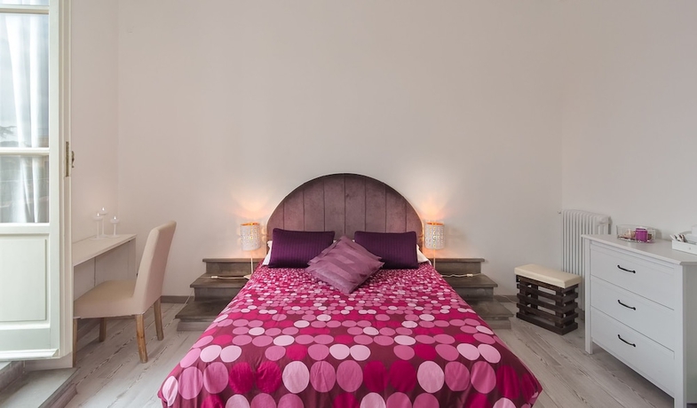 Imagen de la habitación del 7 Rooms, Pisa Ciudad. Foto 10