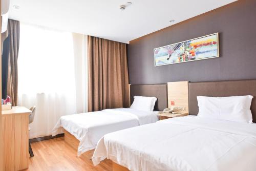 Imagen de la habitación del 7days Premium Shanghai Wild Animal Park. Foto 5