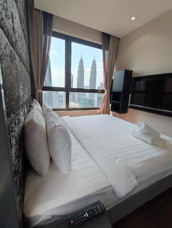 Imagen de la habitación del 8 Kia Peng Suites KLCC by Luna. Foto 3