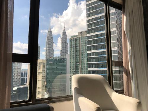 Imagen de la habitación del 8 Kia Peng Suites KLCC by Luna. Foto 5