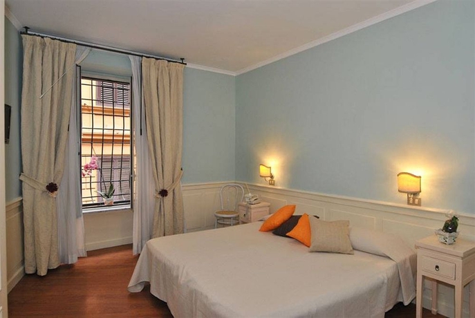 Imagen de la habitación del 95 Rooms In Rome. Foto 13