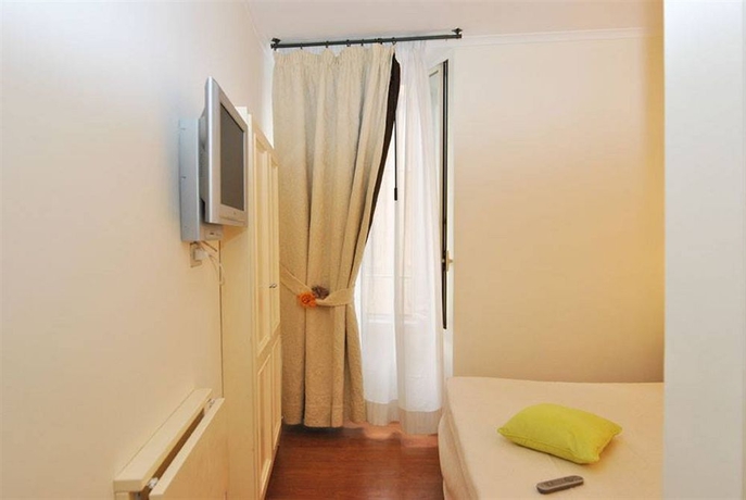 Imagen de la habitación del 95 Rooms In Rome. Foto 14