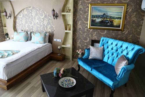 Imagen de la habitación del A Palace Suites. Foto 1